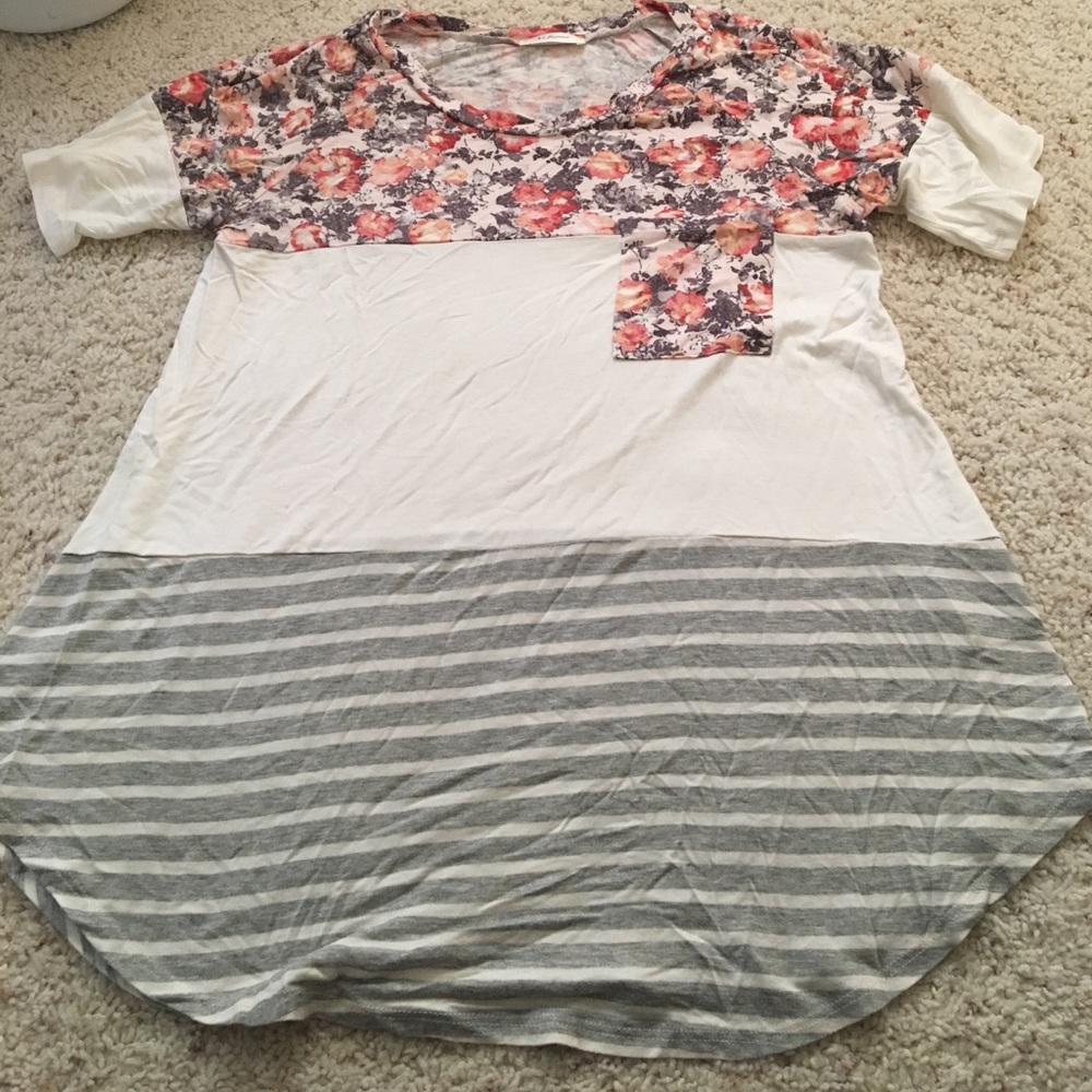 Excellent condition floral and striped top