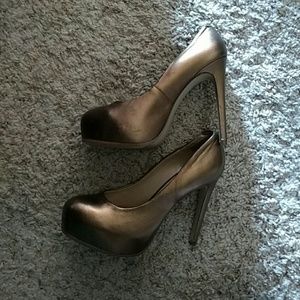 Gold leather high heels
