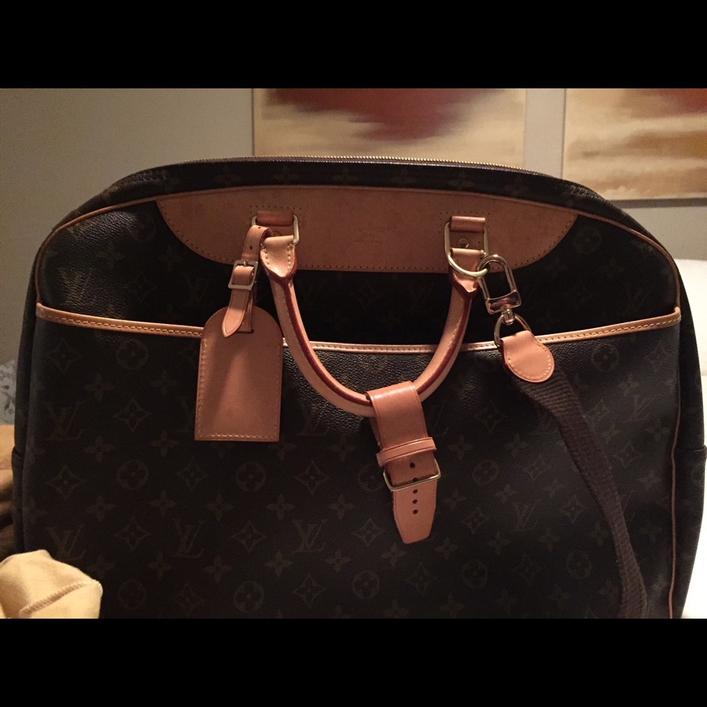 Authentic Louis Vuitton Alize 2 pouch Travel Bag