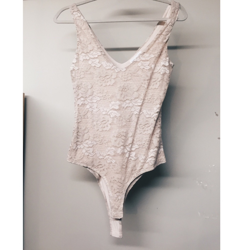 Nude floral lace body suit