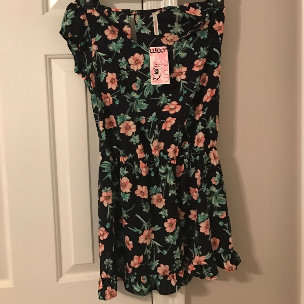 Navy floral love culture cap sleeve romper NWT