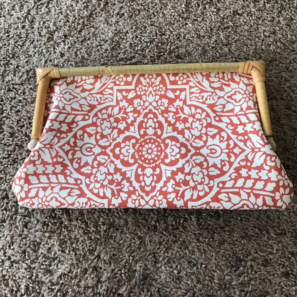 Orange and white clutch