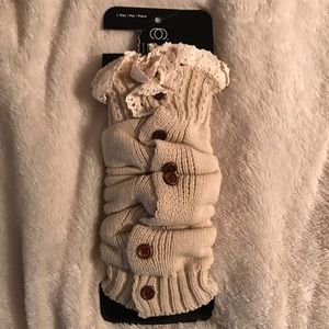 $7/3 for $15. NWT Leg warmer with buttons and lace