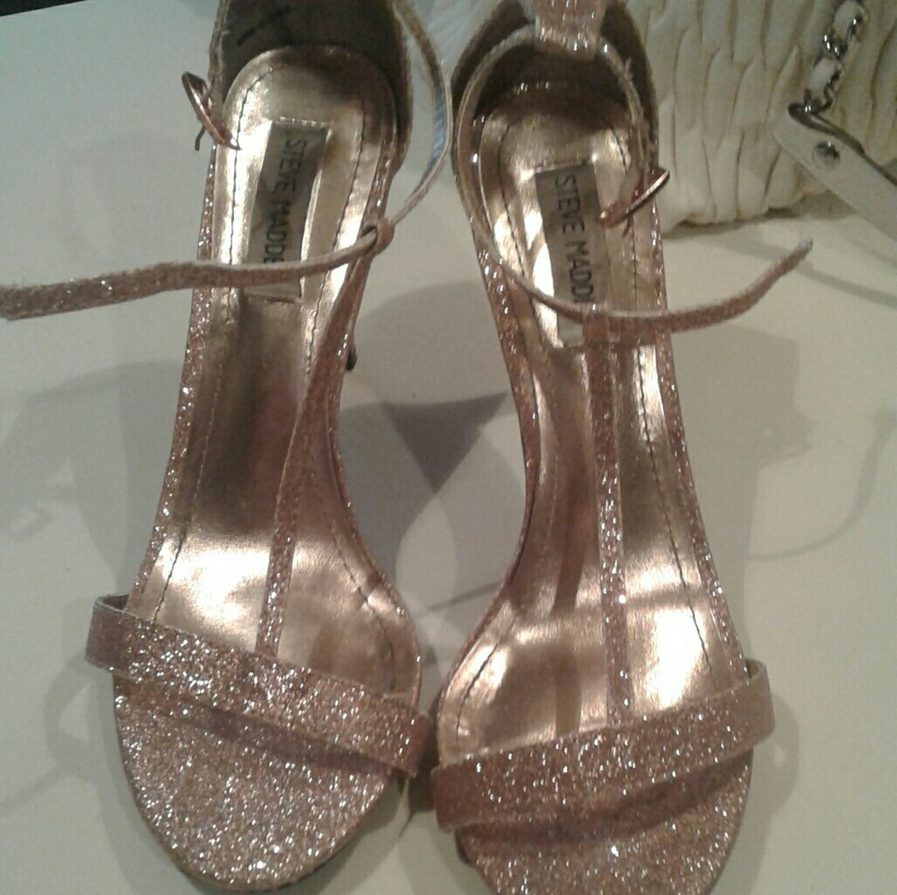 Gold sparkly heels.
