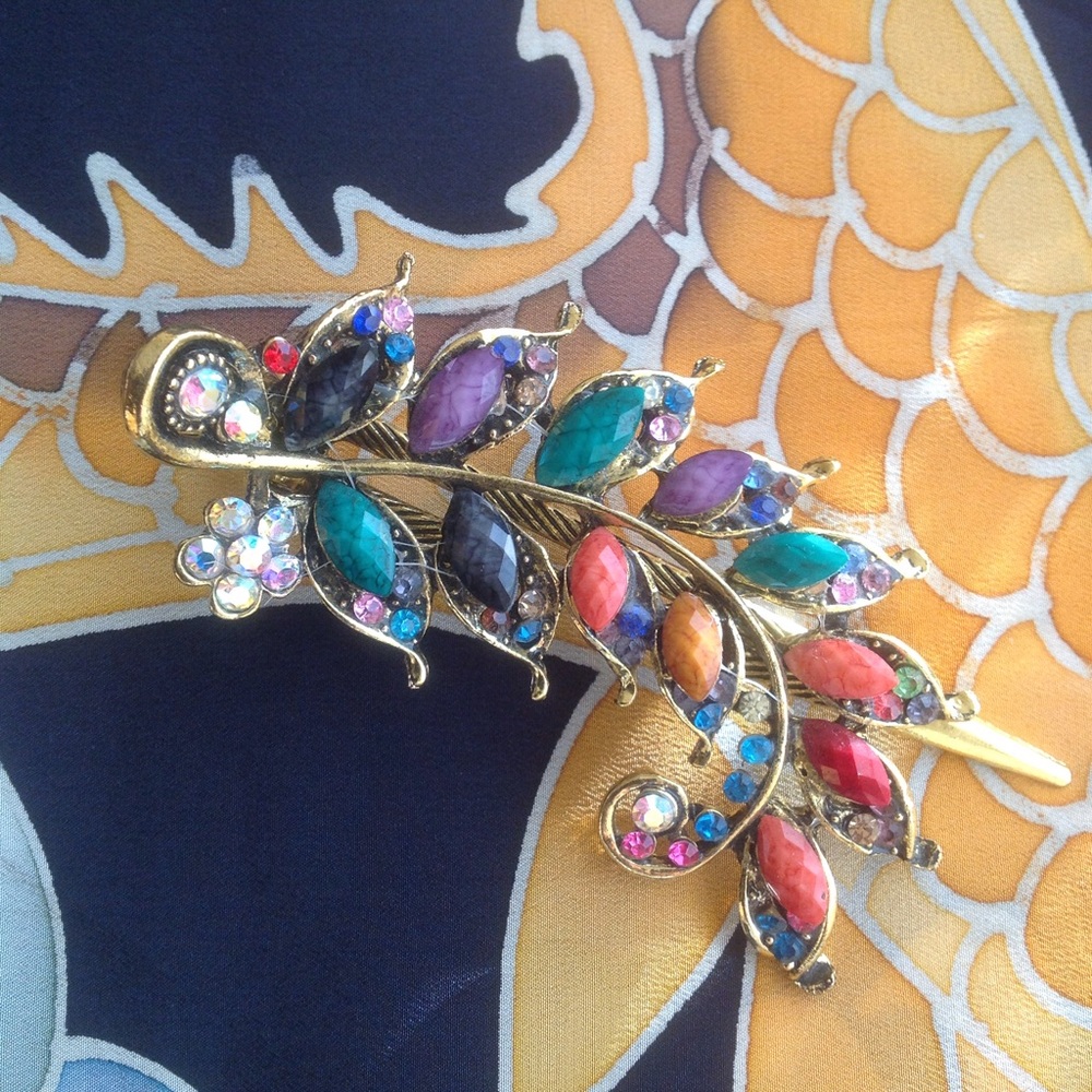 Gold hair clip, metal, rhinestones and stones