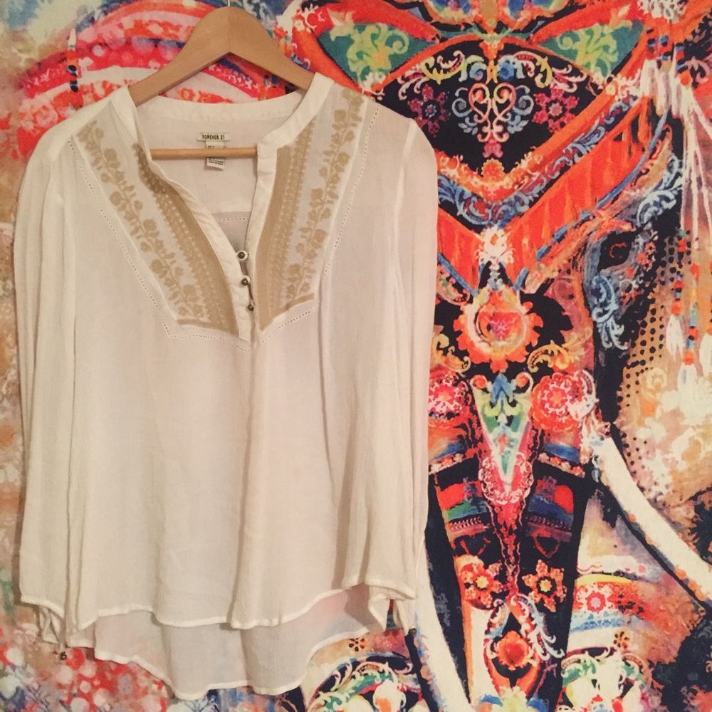 White tunic with gold embroidery