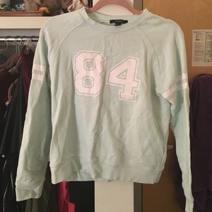Light turquoise athletic shirt