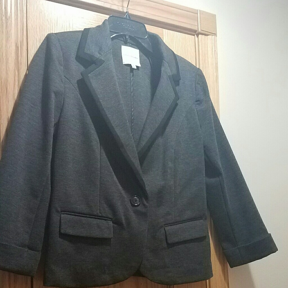 Dark grey blazer with black trim