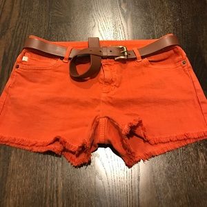 Orange frayed Michael Kors shorts