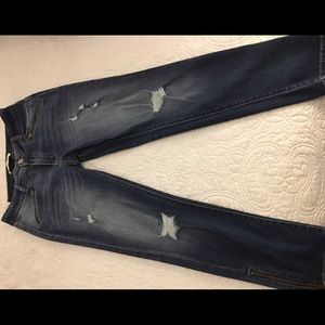 Distressed Super Skinny Jeans With Ankle Zippers