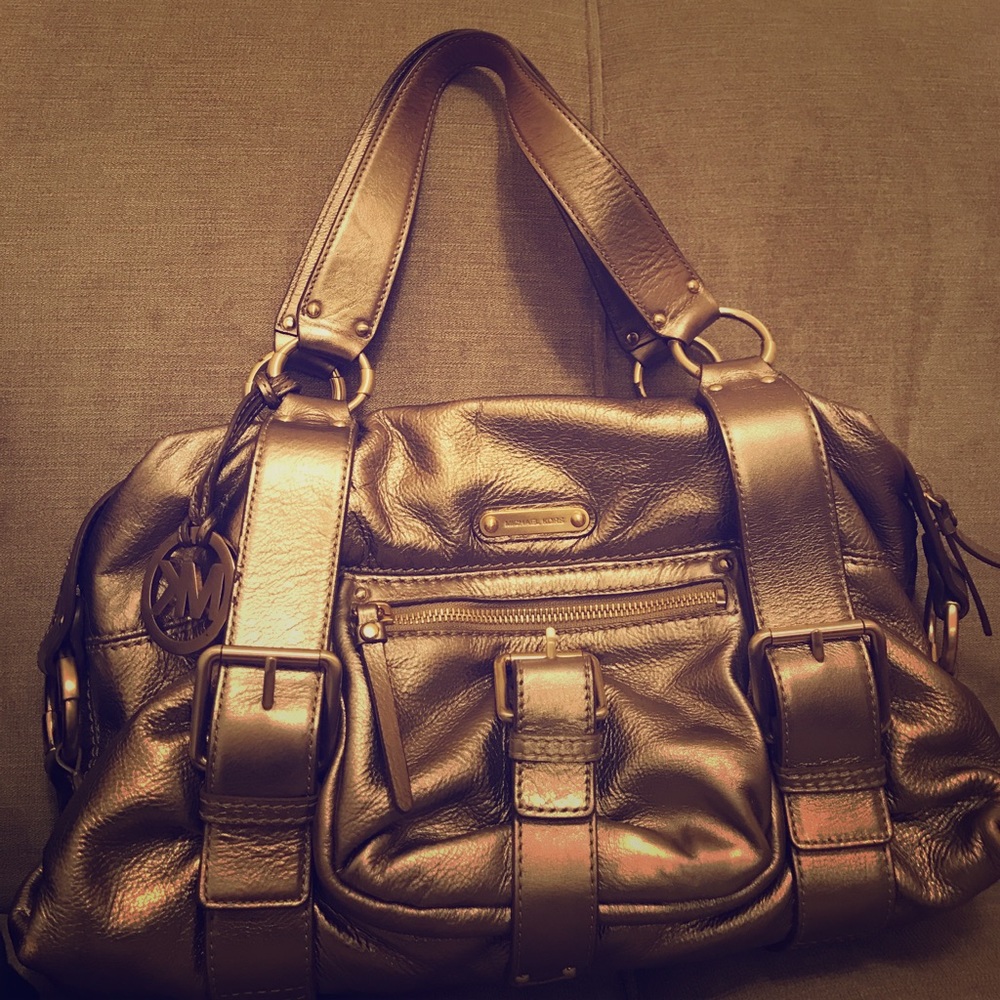 Stylish shimmery gold leather Michael Kors bag.