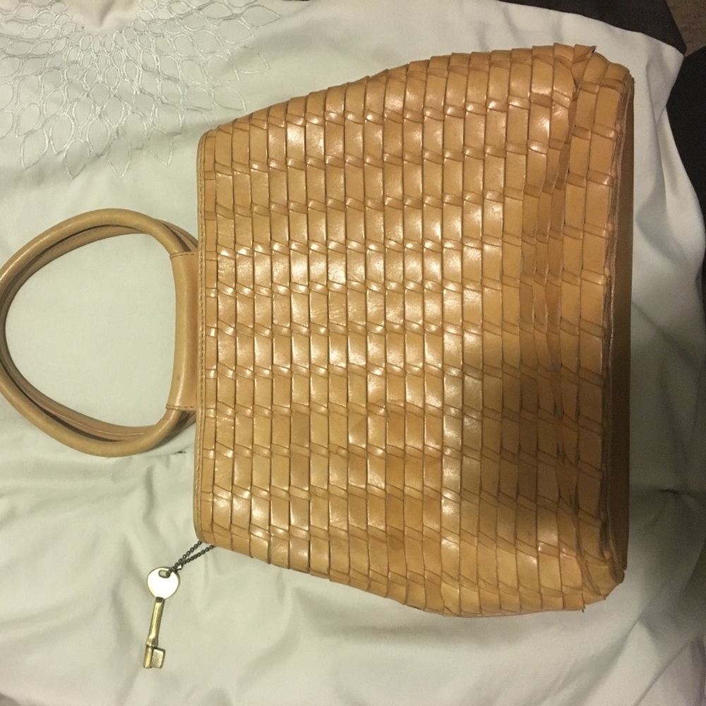 Mustard colored leather fossil bag