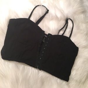Crop top. Adjustable straps. Stretchy back.