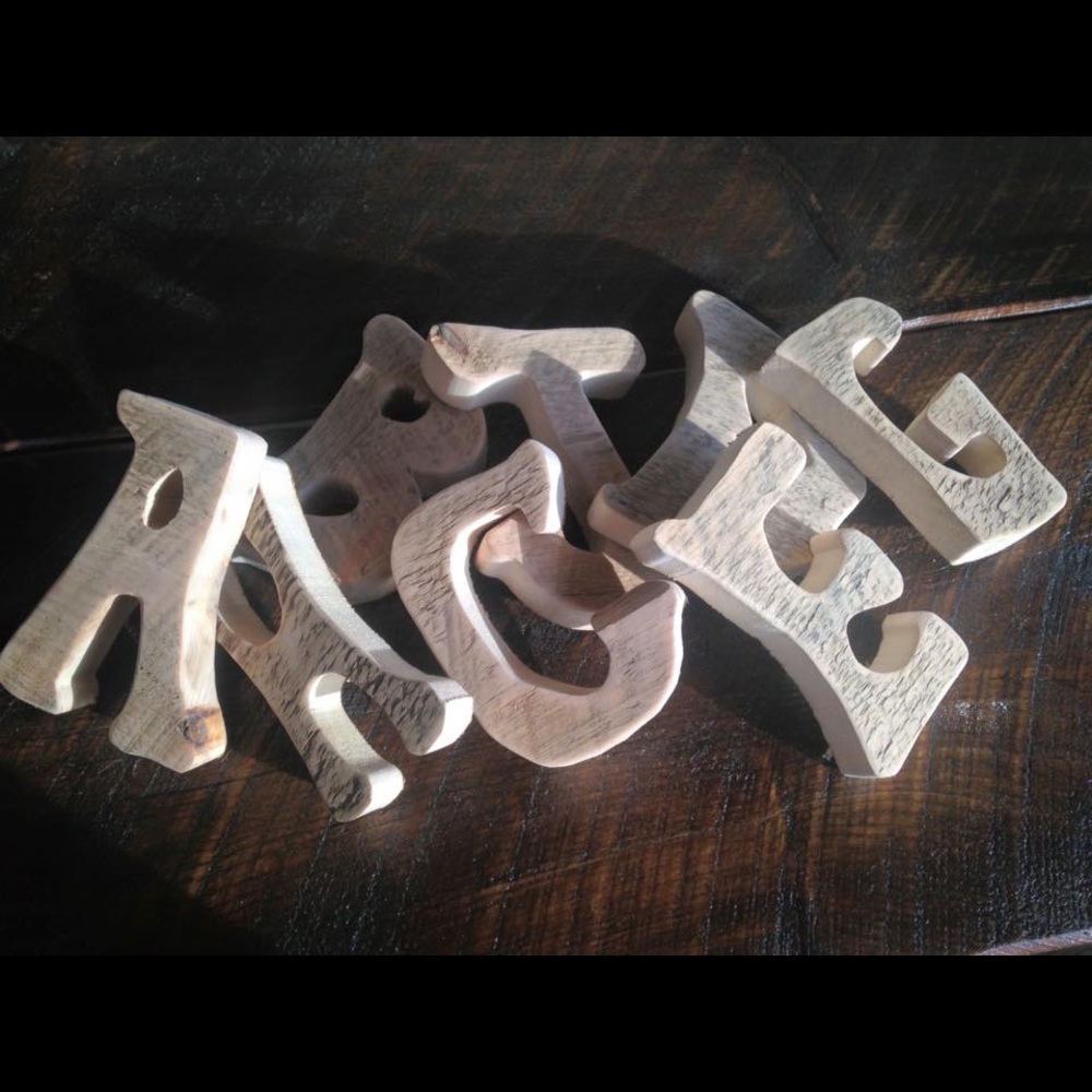 Hand crafted barn wood letters.