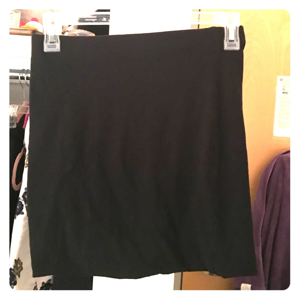 Hip hugging black skirt