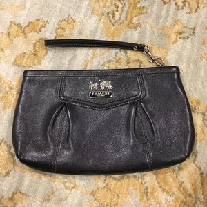 Medium sized Coach pleated wristlet.