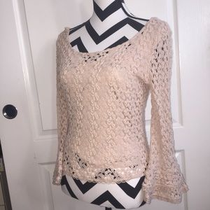 wide-sleeved knit top