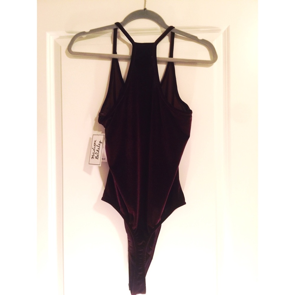 NWT!! Never worn plum bodysuit!