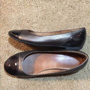 Brown leather flats