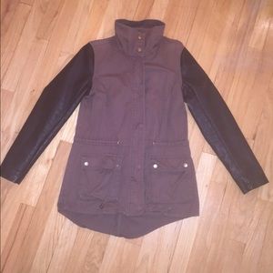 Dark green jacket with faux leather sleeves