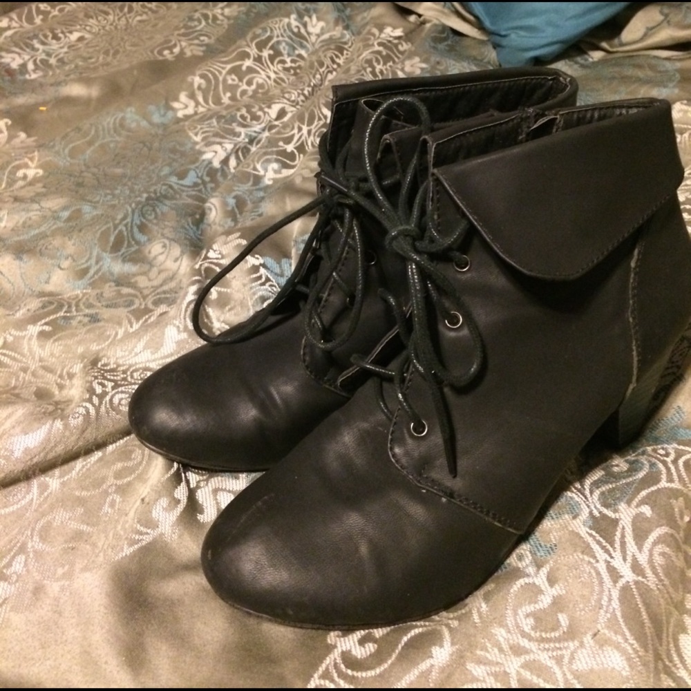 Moderately used black booties, medium size heel