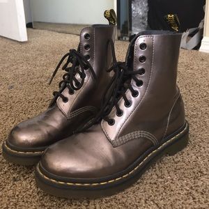 Silver metallic Doc Martens.