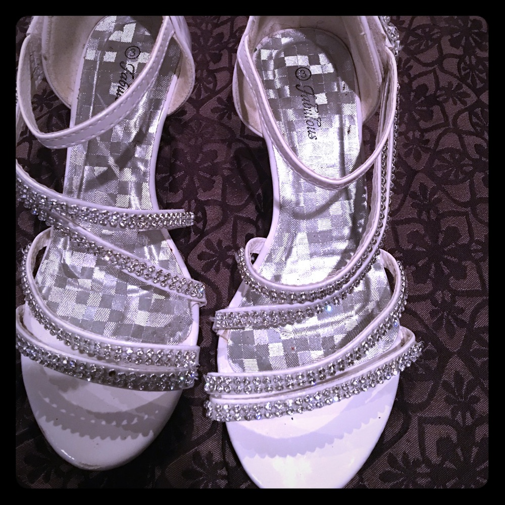 Beautiful white and rhinestone shoes.