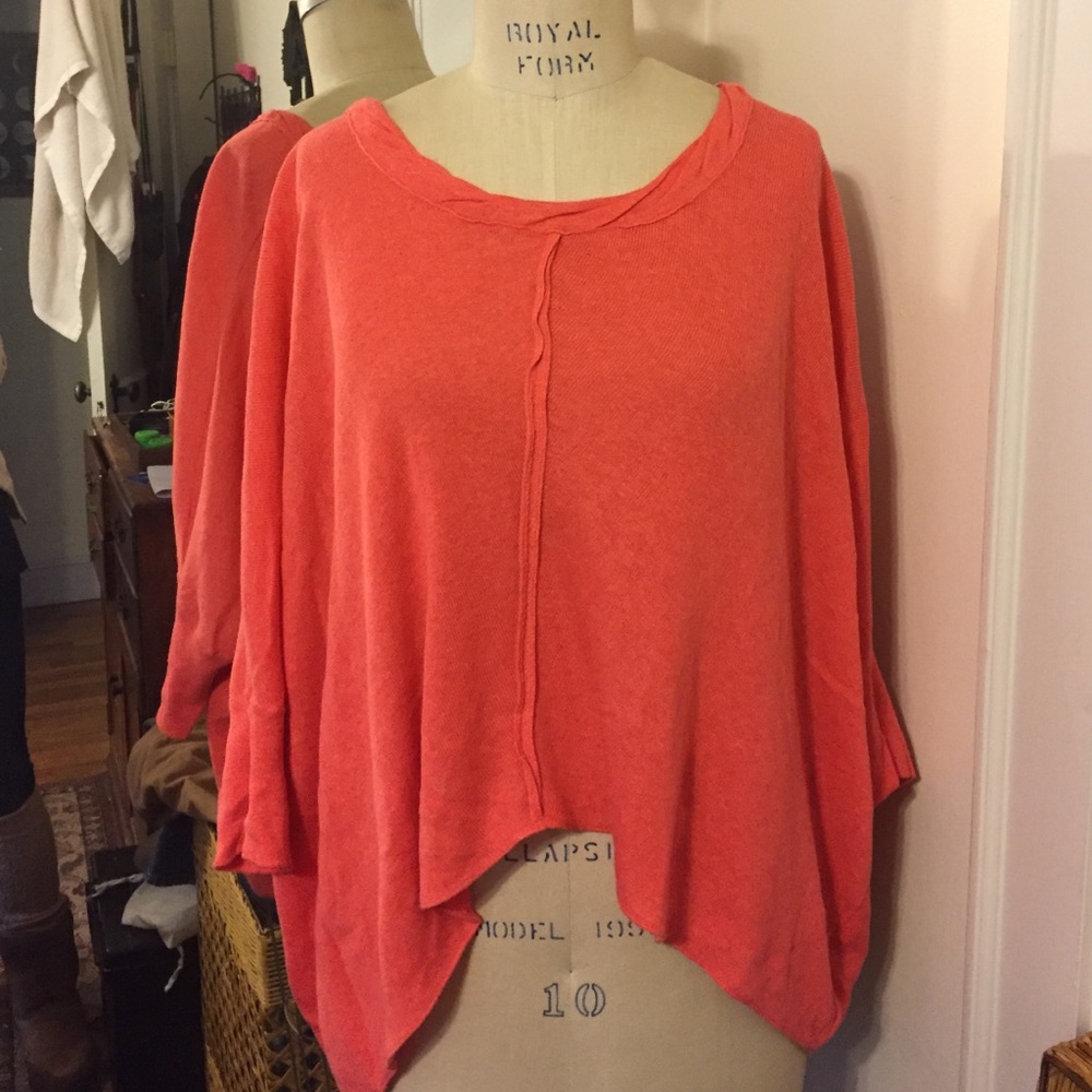 Soft, cozy and relaxed coral Free People sweater