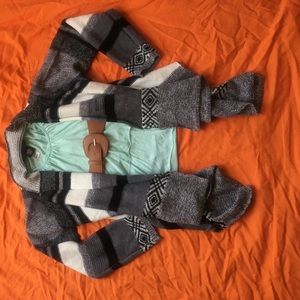 Girl's sweater, top, and belt.