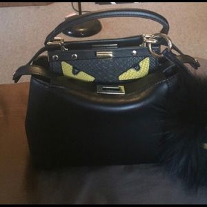 Small black leather monster handbag