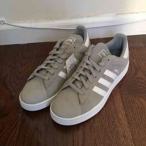 Never been worn Adidas men's sneakers