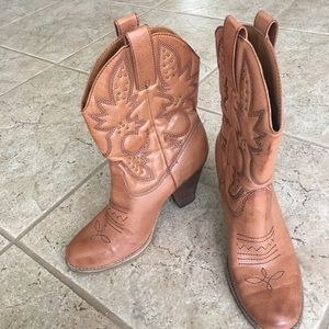 Distressed heeled cowboy boots