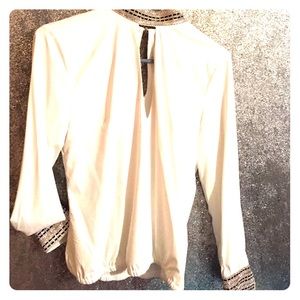 Bebe White tear drop blouse rhinestoned cuffs,neck