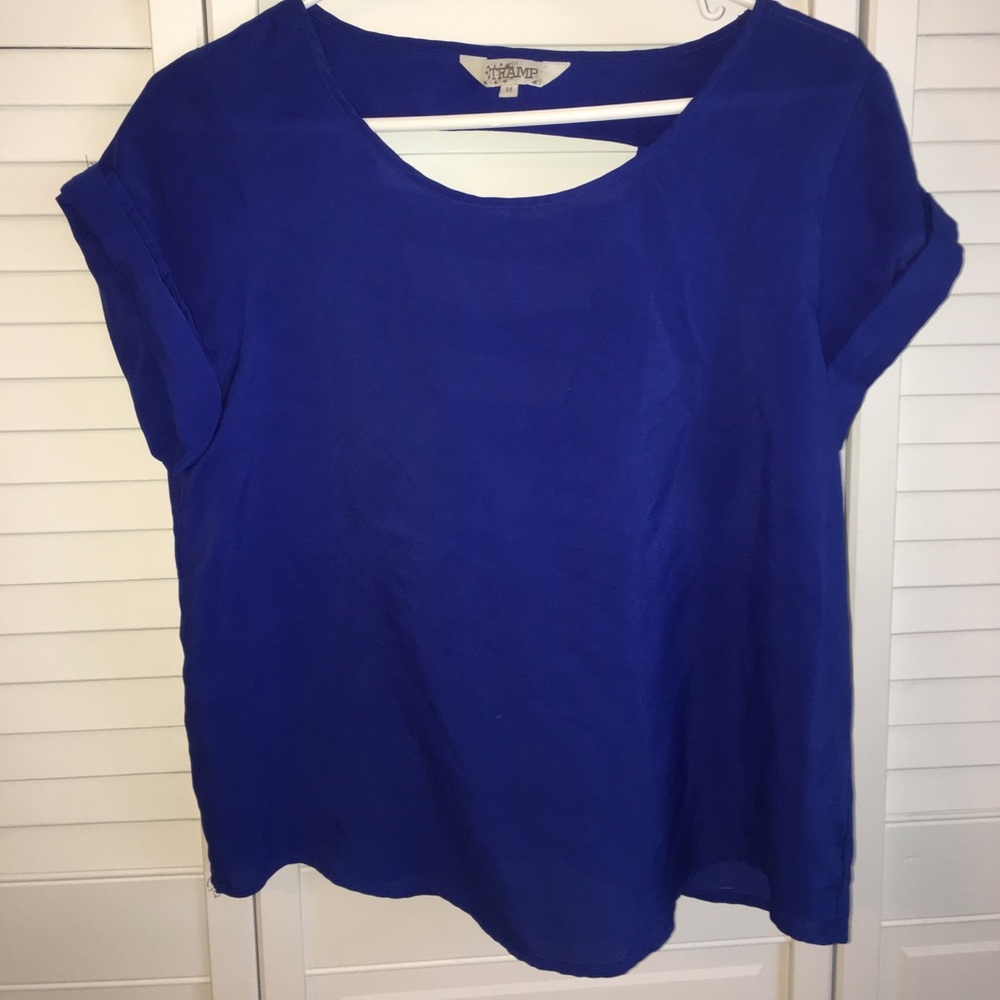 Short sleeve royal blue shirt. Back cut out.
