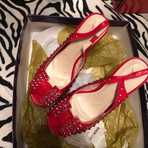 Red studded sling back heels