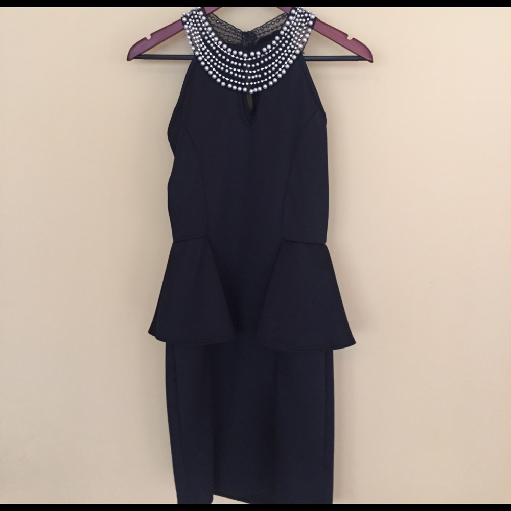 Black embellished peplum dress!