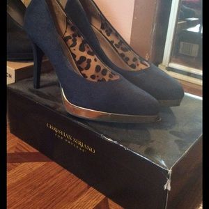 Navy blue suede pumps