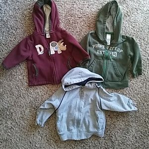 Hooded zip up sweatshirts.