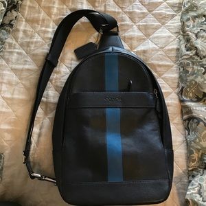 BRAND NEW!!! Small Coach navy and blue backpack.