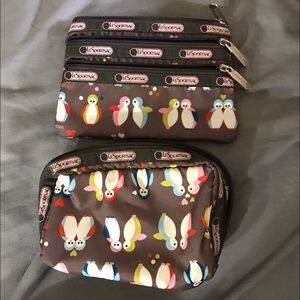 EUC 2 piece Lesportsac penguin print makeup bags