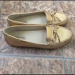 Michael Kors gold flats