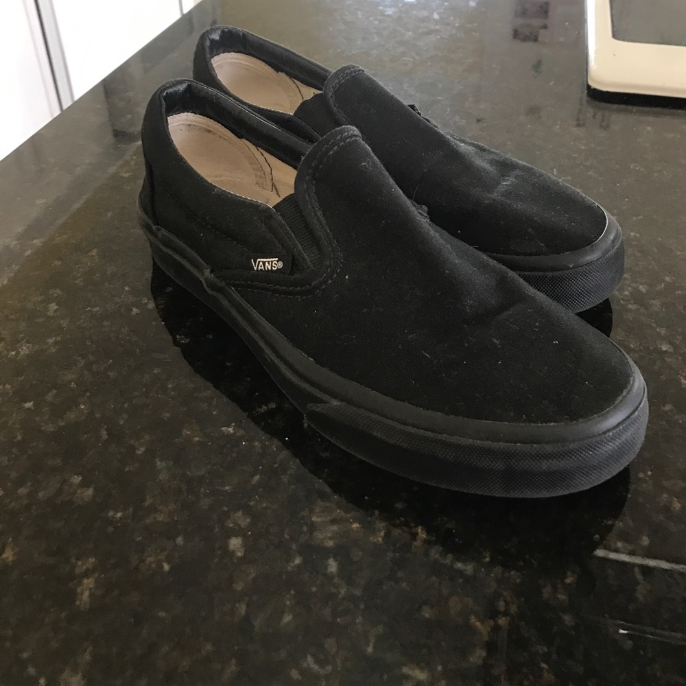All black vans slip ons