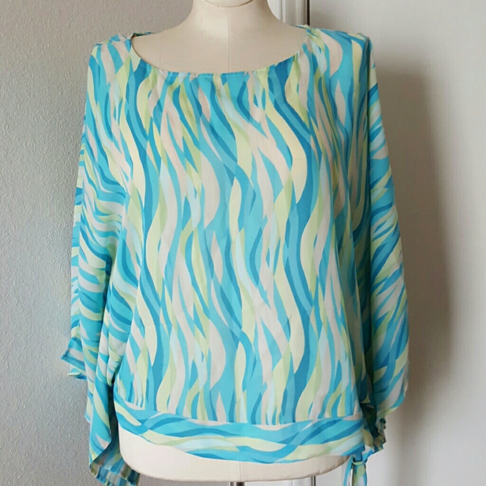 Batwing open arm spring colored blouse