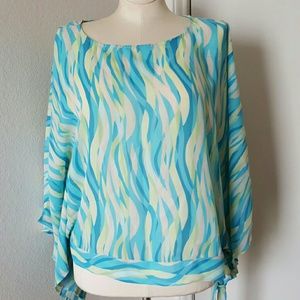 Batwing open arm spring colored blouse