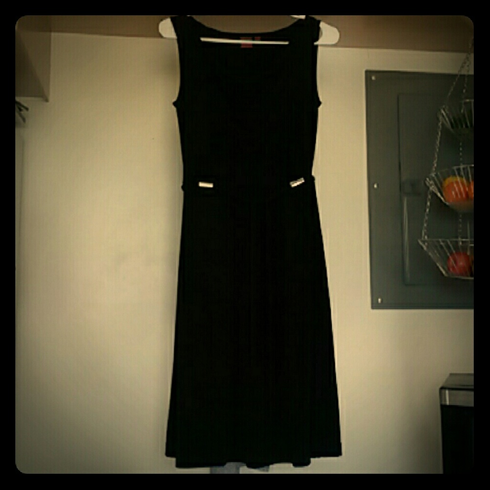 Black drape neck dress with metal detail belt