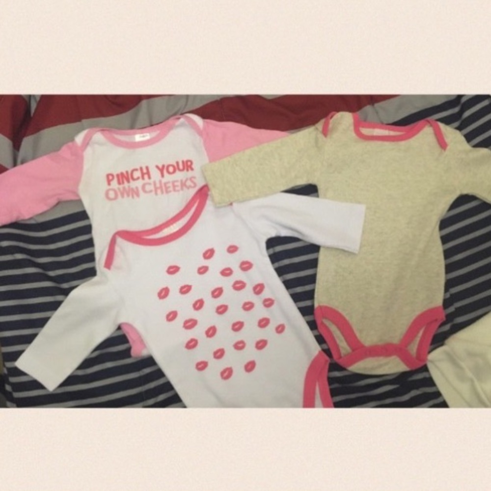 Baby's three assorted onesies
