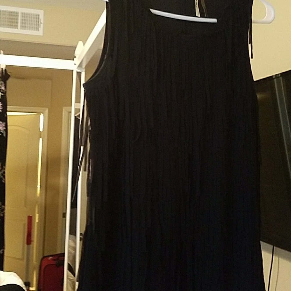 Beautiful fancy blank fringe mini dress.