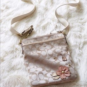Coral and floral Coach Crossbody purse!