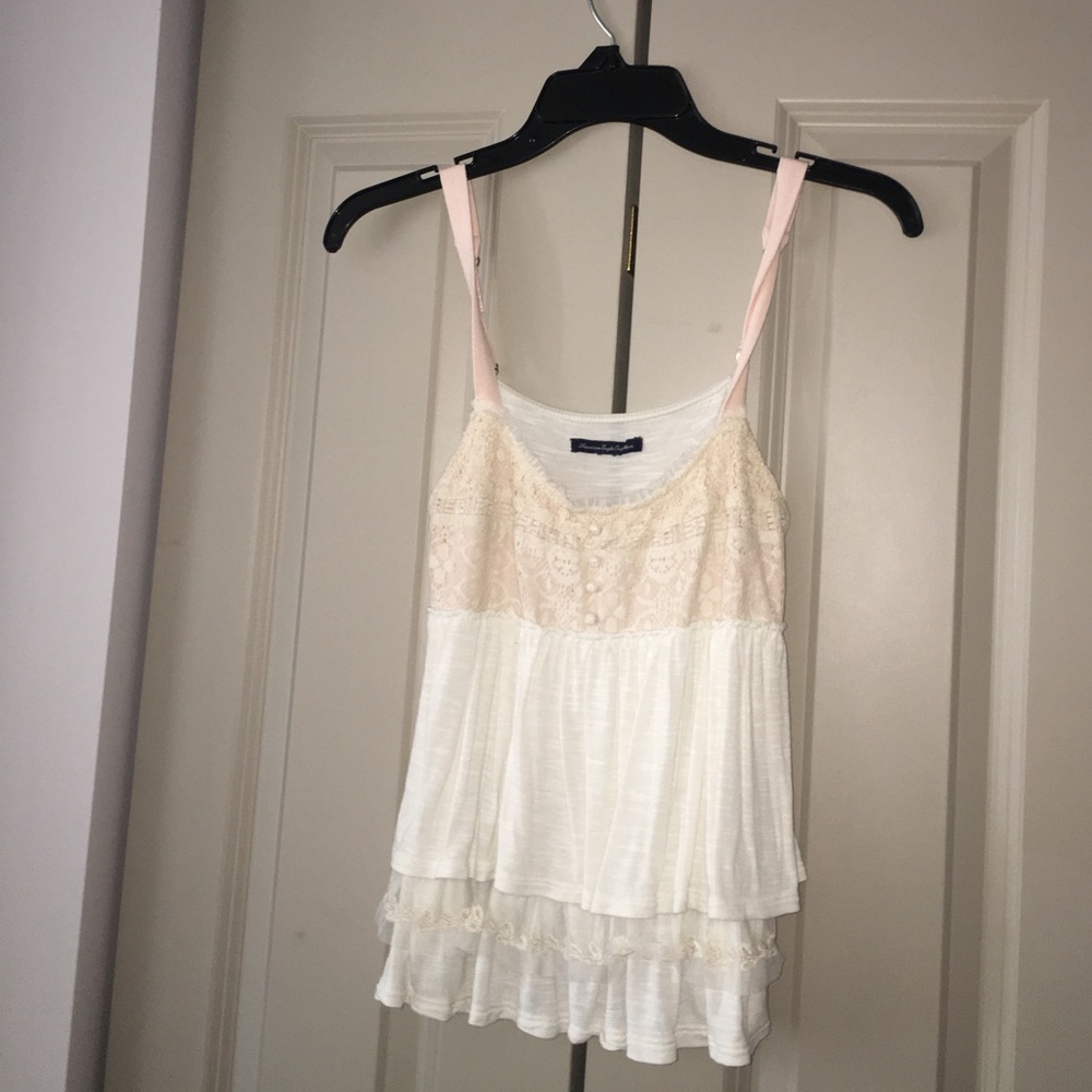 Super cute white tank goes great with cardigans!