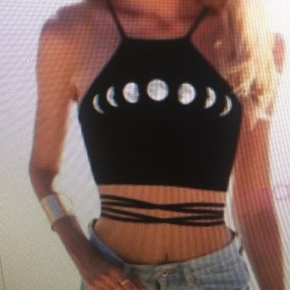 Tops - Never worn out moon crop top with lace up back